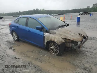2018 Ford Focus SE z VIN 1FADP3FE6JL227653, wystawiony jako Copart lot #56827585 z przebiegiem Nie podano mil oraz Szkoda całkowita • Salvage title. Historia ofert i sprzedaży dostępna na DreamBid. Obrazek 4.