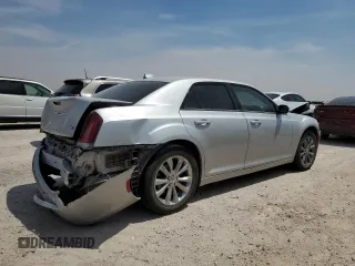 2020 Chrysler 300 S with VIN 2C3CCAGGXLH154801, listed as a Copart auction lot 58155674 with 98,028 mi miles and Salvage Title. Bid and sale history available at DreamBid. Image 3.