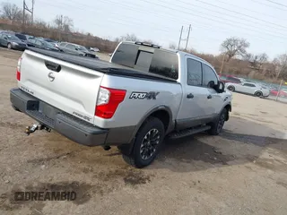 2017 Nissan Titan SL z VIN 1N6AA1E58HN506456, wystawiony jako IAAI lot #41521294 z przebiegiem 59 252 mil mil oraz . Historia ofert i sprzedaży dostępna na DreamBid. Obrazek 4.