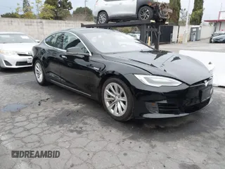 2016 Tesla Model S 70 kWh Battery with VIN 5YJSA1E1XGF154577, listed as a IAAI auction lot 41778697 with 62,630 mi miles. Bid and sale history available at carsss.com. Image 1.