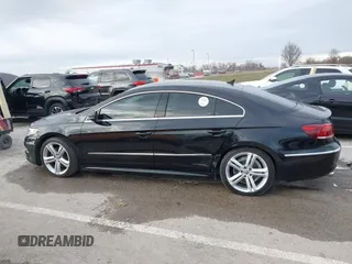 2014 Volkswagen CC R-Line with VIN WVWBN7ANXEE521055, listed as a IAAI auction lot 41197539 with 94,902 mi miles. Bid and sale history available at carsss.com. Image 14.
