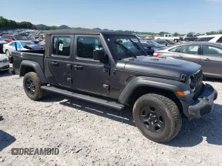2021 Jeep Gladiator Freedom с VIN 1C6HJTAG4ML580023, выставлен на аукционе Copart как лот 57586475 с пробегом 64 022 миль миль и Списание • Salvage title. История ставок и продаж доступна на DreamBid. Изображение 4.