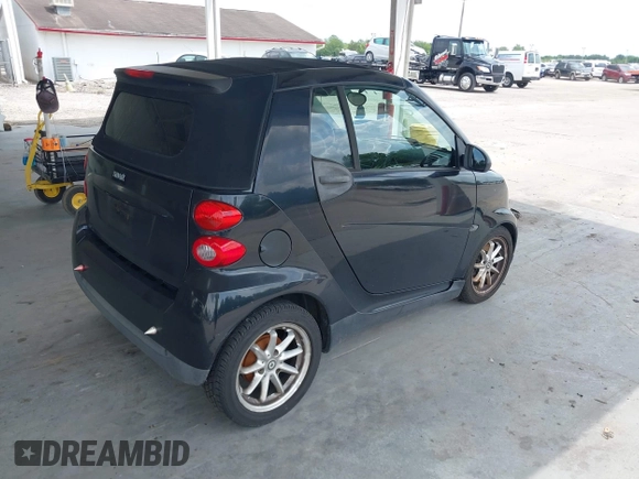 2009 Smart fortwo Passion with VIN WMEEK31X19K294234, listed as a IAAI auction lot 42225528 with 85,905 mi miles and . Bid and sale history available at DreamBid. Image 4.