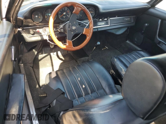 1971 Porsche 911 with VIN 9111120590, listed as a Copart auction lot 52559665 with 44,582 mi miles and Salvage title. Bid and sale history available at DreamBid. Image 8.