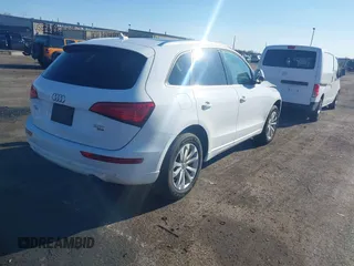 2014 Audi Q5 Premium Plus with VIN WA1LFAFP3EA106931, listed as a IAAI auction lot 41933150 with 140,104 mi miles and . Bid and sale history available at DreamBid. Image 4.