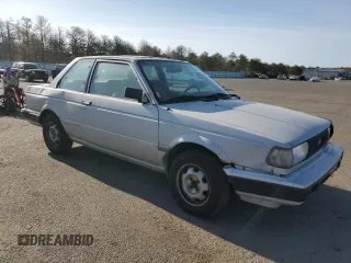 1990 Nissan Sentra z VIN 1N4GB22B7LC773110, wystawiony jako Copart lot #55384855 z przebiegiem 48 159 mil mil oraz Tytuł czysty. Historia ofert i sprzedaży dostępna na DreamBid. Obrazek 4.