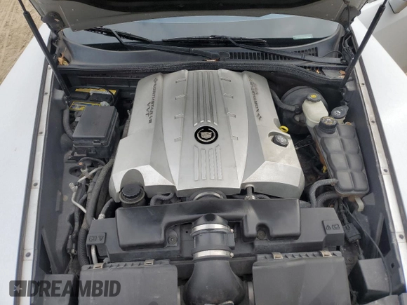 2005 Cadillac XLR z VIN 1G6YV34AX55603706, wystawiony jako Copart lot #81643824 z przebiegiem 84 951 mil mil oraz Czysty tytuł • Clean title. Historia ofert i sprzedaży dostępna na DreamBid. Obrazek 11.