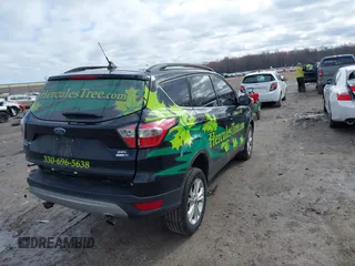 2018 Ford Escape SEL with VIN 1FMCU9HD2JUD30385, listed as a IAAI auction lot 41919203 with 160,868 mi miles. Bid and sale history available at carsss.com. Image 4.