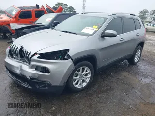 2016 Jeep Cherokee Latitude with VIN 1C4PJLCS7GW336973, listed as a IAAI auction lot 41769839 with 89,805 mi miles. Bid and sale history available at carsss.com. Image 2.