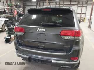 2015 Jeep Grand Cherokee Summit with VIN 1C4RJFJT6FC754799, listed as a IAAI auction lot 41699124 with 124,206 mi miles and . Bid and sale history available at DreamBid. Image 16.