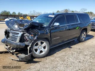 2015 Chevrolet Suburban LTZ with VIN 1GNSCKKC5FR233998, listed as a Copart auction lot 48507395 with 168,536 mi miles and Salvage Title. Bid and sale history available at carsss.com. Image 1.