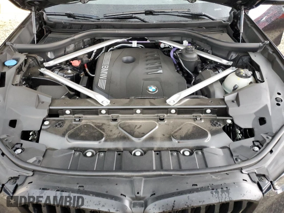 2024 BMW X5 sDrive40i with VIN 5UX13EU04R9T91552, listed as a Copart auction lot 55486545 with 12,995 mi miles and Salvage title. Bid and sale history available at DreamBid. Image 12.