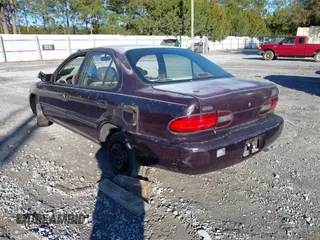 1996 Geo Prizm z VIN 1Y1SK5267TZ023983, wystawiony jako IAAI lot #41366835 z przebiegiem 156 429 mil mil oraz . Historia ofert i sprzedaży dostępna na DreamBid. Obrazek 3.