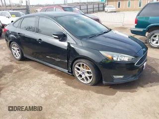 2015 Ford Focus SE with VIN 1FADP3F26FL356554, listed as a IAAI auction lot 41773139 with 143,911 mi miles. Bid and sale history available at carsss.com. Image 1.