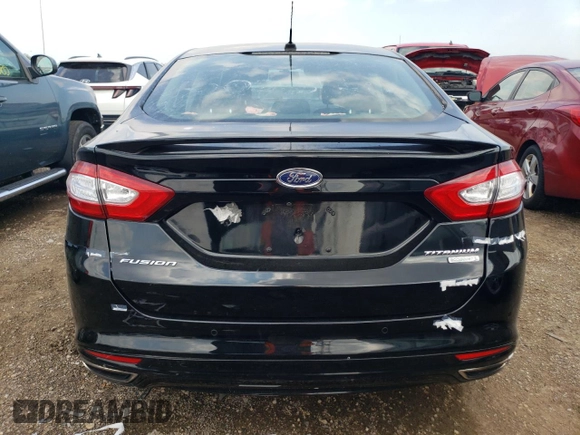 2016 Ford Fusion Titanium z VIN 3FA6P0K90GR399896, wystawiony jako Copart lot #63504265 z przebiegiem 37 066 mil mil oraz Szkoda całkowita • Salvage title. Historia ofert i sprzedaży dostępna na DreamBid. Obrazek 6.