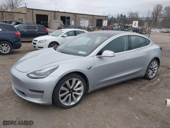 2018 Tesla Model 3 Long Range Battery with VIN 5YJ3E1EBXJF116906, listed as a IAAI auction lot 41913259 with 117,740 mi miles. Bid and sale history available at carsss.com. Image 19.