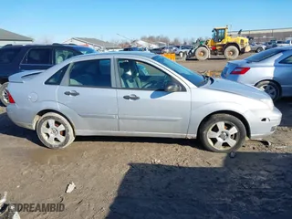 2007 Ford Focus S with VIN 1FAHP34N87W204936, listed as a IAAI auction lot 41755544 with 185,030 mi miles. Bid and sale history available at carsss.com. Image 13.