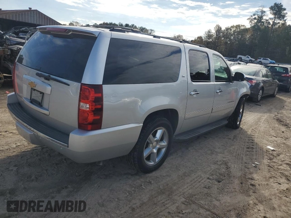 2014 Chevrolet Suburban LTZ with VIN 1GNSCKE02ER141764, listed as a Copart auction lot 85005524 with 234,019 mi miles and Salvage title. Bid and sale history available at DreamBid. Image 3.