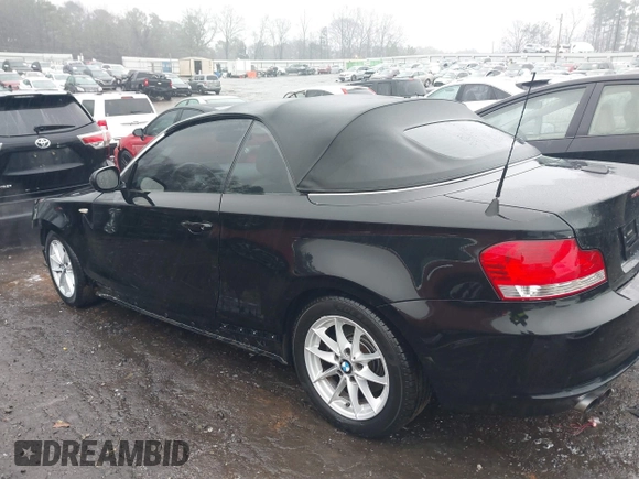 2011 BMW 1 Series 128i with VIN WBAUL7C52BVM79176, listed as a IAAI auction lot 41387249 with 99,145 mi miles and . Bid and sale history available at carsss.com. Image 15.