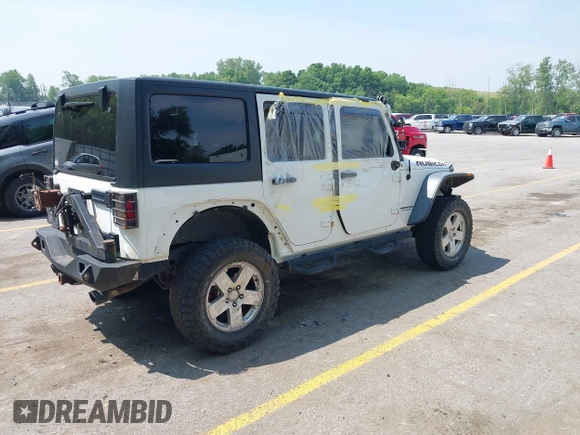 2015 Jeep Wrangler Unlimited Rubicon z VIN 1C4BJWFGXFL755810, wystawiony jako IAAI lot #42495531 z przebiegiem 109 668 mil mil oraz . Historia ofert i sprzedaży dostępna na DreamBid. Obrazek 4.
