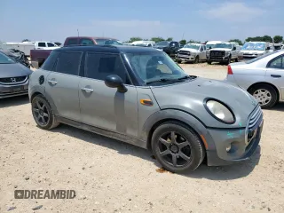 2015 MINI Hardtop 4 Door с VIN WMWXS5C51FT830794, выставлен на аукционе Copart как лот 57451785 с пробегом 171 669 миль миль и Списание • Salvage title. История ставок и продаж доступна на DreamBid. Изображение 4.