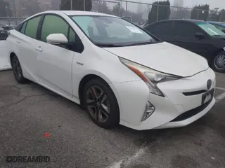 2017 Toyota Prius Two with VIN JTDKARFUXH3037751, listed as a IAAI auction lot 41471974 with 140,787 mi miles. Bid and sale history available at carsss.com. Image 1.
