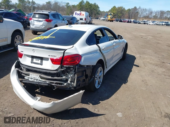 2019 BMW 4 Series 440i xDrive with VIN WBA4J7C58KBM76130, listed as a IAAI auction lot 41885173 with 43,690 mi miles and . Bid and sale history available at carsss.com. Image 4.