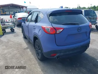 2013 Mazda CX-5 Sport with VIN JM3KE2BE8D0160381, listed as a IAAI auction lot 42438461 with 213,354 mi miles and . Bid and sale history available at DreamBid. Image 3.