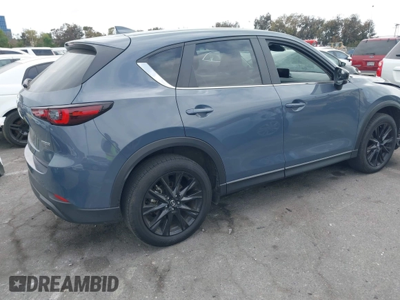 2024 Mazda CX-5 2.5 S Carbon Edition with VIN JM3KFBCL6R0482860, listed as a IAAI auction lot 42108547 with 30,802 mi miles. Bid and sale history available at carsss.com. Image 4.