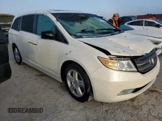 2012 Honda Odyssey Touring with VIN 5FNRL5H96CB144690, listed as a Copart auction lot 75176494 with 0 mi miles and Salvage Title. Bid and sale history available at carsss.com. Image 4.