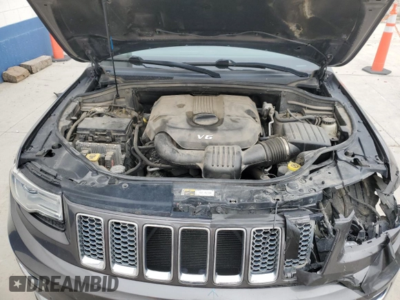 2014 Jeep Grand Cherokee Summit с VIN 1C4RJFJG4EC427075, выставлен на аукционе Copart как лот 49504095 с пробегом 147 342 миль миль и Списание • Salvage title. История ставок и продаж доступна на DreamBid. Изображение 12.