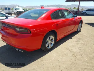 2023 Dodge Charger SXT with VIN 2C3CDXBG6PH531430, listed as a IAAI auction lot 42164798 with 49,543 mi miles. Bid and sale history available at carsss.com. Image 4.