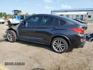 2018 BMW X4 M40i with VIN 5UXXW7C55J0W64498, listed as a Copart auction lot 58873794 with 144,148 mi miles and Salvage Title. Bid and sale history available at carsss.com. Image 2.