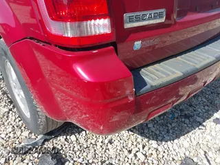 2009 Ford Escape XLS with VIN 1FMCU02759KC80412, listed as a IAAI auction lot 42228138 with 181,786 mi miles and . Bid and sale history available at DreamBid. Image 14.