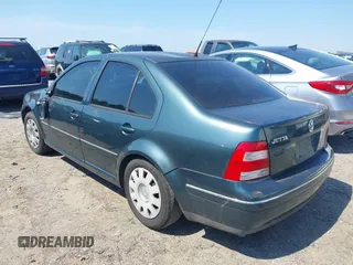 2004 Volkswagen Jetta GL with VIN 3VWRK69M84M019289, listed as a IAAI auction lot 42552949 with 158,980 mi miles and . Bid and sale history available at DreamBid. Image 3.