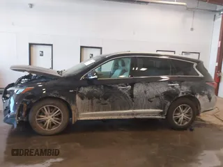 2019 Infiniti QX60 Luxe with VIN 5N1DL0MM6KC548023, listed as a IAAI auction lot 42267143 with 94,231 mi miles and . Bid and sale history available at DreamBid. Image 14.