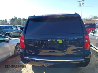 2020 Chevrolet Tahoe LTZ with VIN 1GNSCCKCXLR106732, listed as a IAAI auction lot 41486660 with Not provided miles and . Bid and sale history available at DreamBid. Image 17.