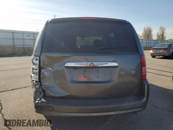 2010 Chrysler Town & Country Touring Plus with VIN 2A4RR8DX2AR358284, listed as a Copart auction lot 54311385 with 169,384 mi miles and Salvage Title. Bid and sale history available at DreamBid. Image 6.