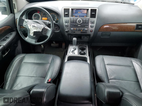 2012 Nissan Armada Platinum z VIN 5N1AA0NC4CN613049, wystawiony jako Copart lot #64414564 z przebiegiem 143 009 mil mil oraz Szkoda całkowita • Salvage title. Historia ofert i sprzedaży dostępna na DreamBid. Obrazek 8.