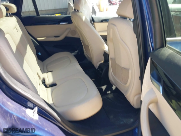 2017 BMW X1 xDrive28i with VIN WBXHT3C33H5F82035, listed as a IAAI auction lot 41944399 with 102,942 mi miles. Bid and sale history available at carsss.com. Image 8.
