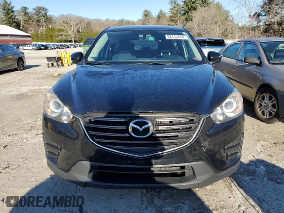 2016 Mazda CX-5 Sport with VIN JM3KE2BE1G0629430, listed as a Copart auction lot 82442654 with 130,289 mi miles and Salvage Title. Bid and sale history available at DreamBid. Image 5.
