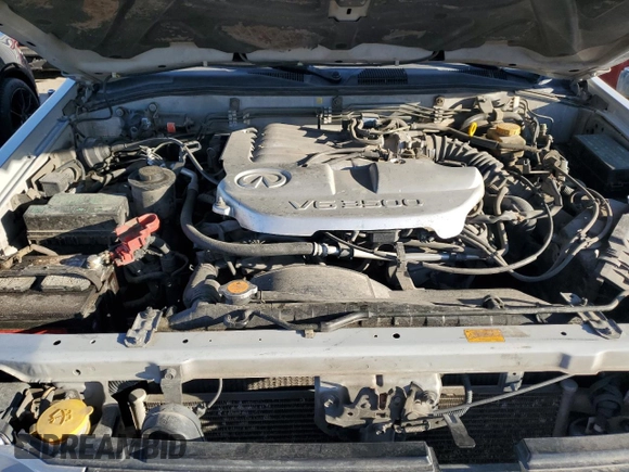 2002 Infiniti QX4 Luxury z VIN JNRDR09Y82W261103, wystawiony jako Copart lot #72452414 z przebiegiem 256 625 mil mil oraz Szkoda całkowita • Salvage title. Historia ofert i sprzedaży dostępna na DreamBid. Obrazek 11.
