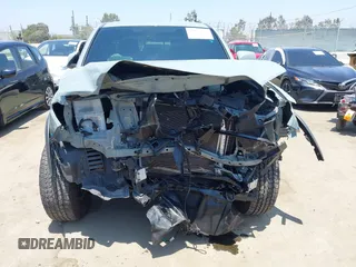 2022 Toyota Tacoma SR with VIN 3TYCZ5AN0NT104300, listed as a IAAI auction lot 42652503 with 18,071 mi miles and . Bid and sale history available at DreamBid. Image 6.