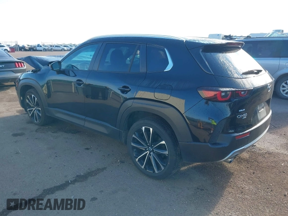 2023 Mazda CX-50 2.5 Turbo with VIN 7MMVABXY9PN154424, listed as a IAAI auction lot 40132755 with 10,620 mi miles. Bid and sale history available at carsss.com. Image 3.