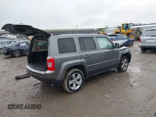 2013 Jeep Patriot Latitude with VIN 1C4NJPFB8DD218948, listed as a IAAI auction lot 41072937 with 126,140 mi miles and . Bid and sale history available at carsss.com. Image 4.