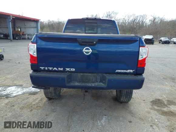 2017 Nissan Titan Pro-4X z VIN 1N6BA1F45HN519305, wystawiony jako IAAI lot #41689197 z przebiegiem 116 562 mil mil oraz . Historia ofert i sprzedaży dostępna na DreamBid. Obrazek 16.