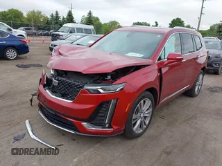 2024 Cadillac XT6 AWD Premium Luxury with VIN 1GYKPDRSXRZ724989, listed as a IAAI auction lot 42378559 with 22,520 mi miles and . Bid and sale history available at DreamBid. Image 17.