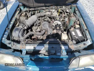 1993 Ford Mustang z VIN 1FACP44MXPF128112, wystawiony jako Copart lot #54756785 z przebiegiem 92 587 mil mil oraz Czysty tytuł • Clean title. Historia ofert i sprzedaży dostępna na DreamBid. Obrazek 11.