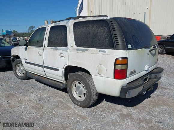 2005 GMC Yukon SLT with VIN 1GKEC13T15J147023, listed as a IAAI auction lot 41993666 with 250,216 mi miles. Bid and sale history available at carsss.com. Image 3.