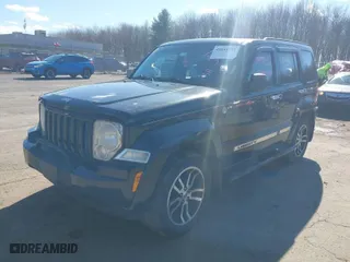 2012 Jeep Liberty Sport with VIN 1C4PJMAK5CW140047, listed as a IAAI auction lot 41844152 with 106,647 mi miles. Bid and sale history available at carsss.com. Image 2.
